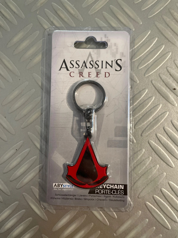 Porte clé assassin’s creed neuf